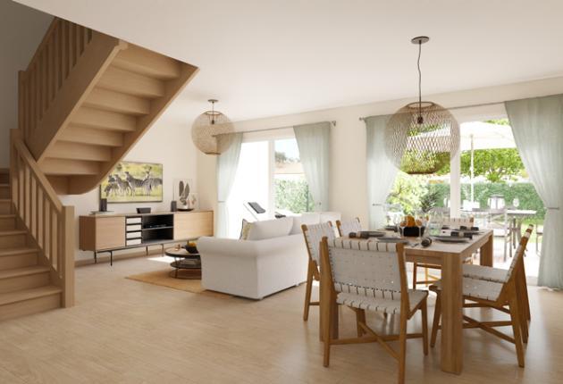 Pièce de vie lumineuse avec escalier dans une maison neuve en accession sociale aux Herbiers