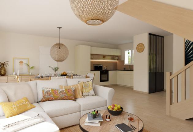 Séjour spacieux avec escalier dans une maison neuve en accession sociale PSLA au Domaine du Ruisseau de L’Aumarière