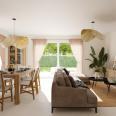 Pièce de vie lumineuse de la maison neuve trois chambres lot cinq en accession sociale PSLA au Domaine du Ruisseau de L’Aumarière